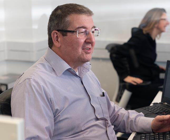 An IT technician controls a virtual server