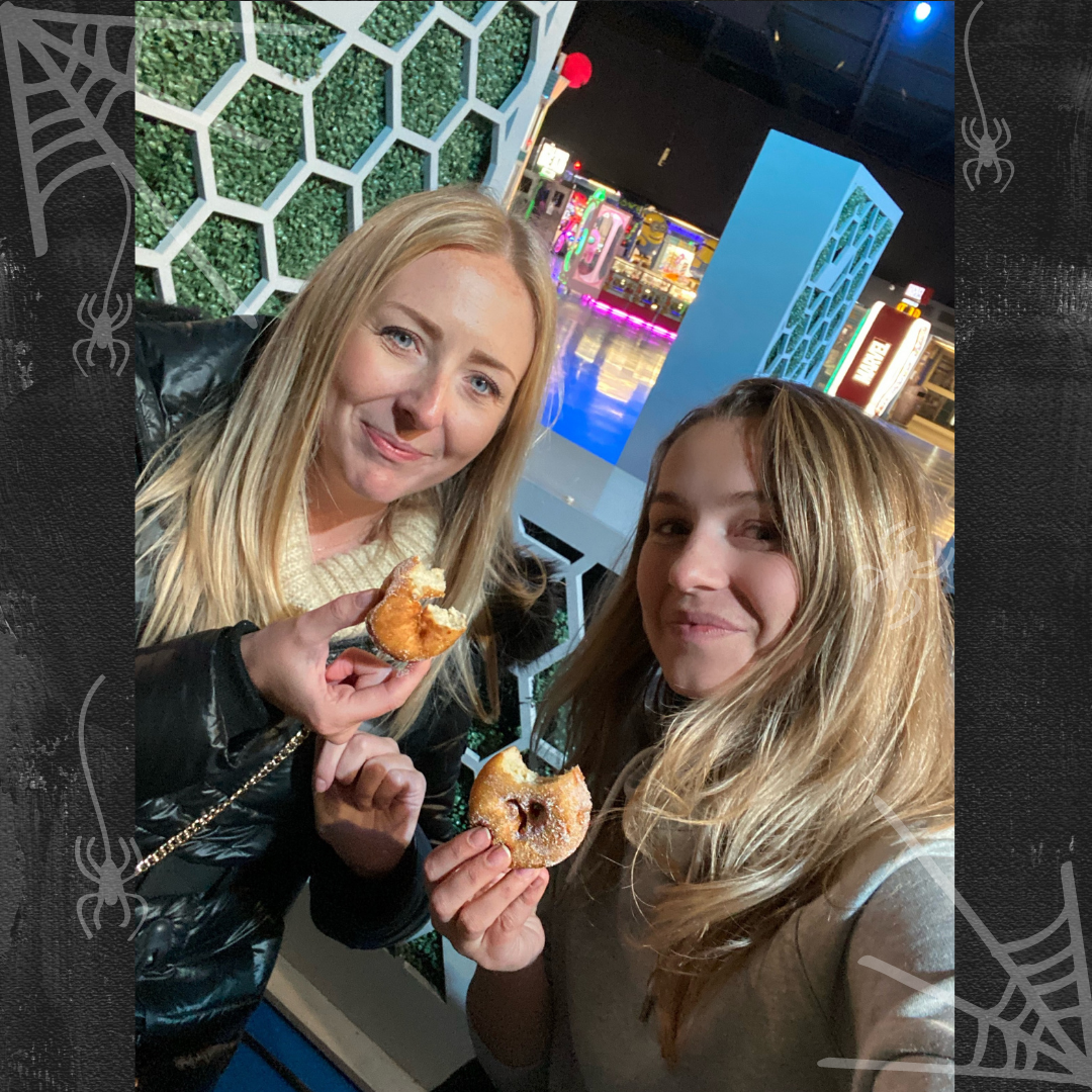 Hayley and Sammy with doughnuts